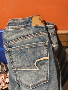American Eagle Outfitters Medium Blue Denim Jeans with Tan Stitching